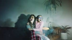 The two women with a popcorn watch Both Eyes Open