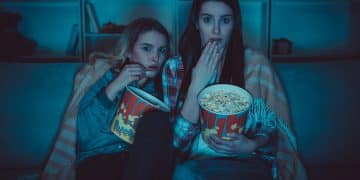 The two women with a popcorn watch Both Eyes Open